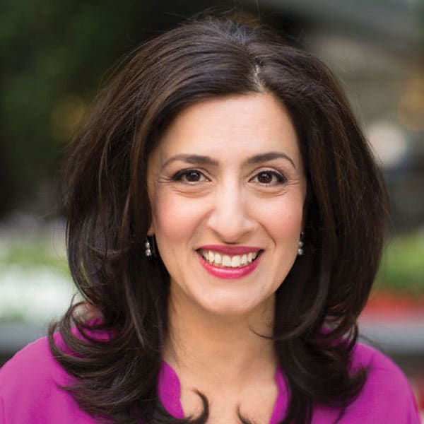 Image description: headshot of smiling woman, the AHF founder