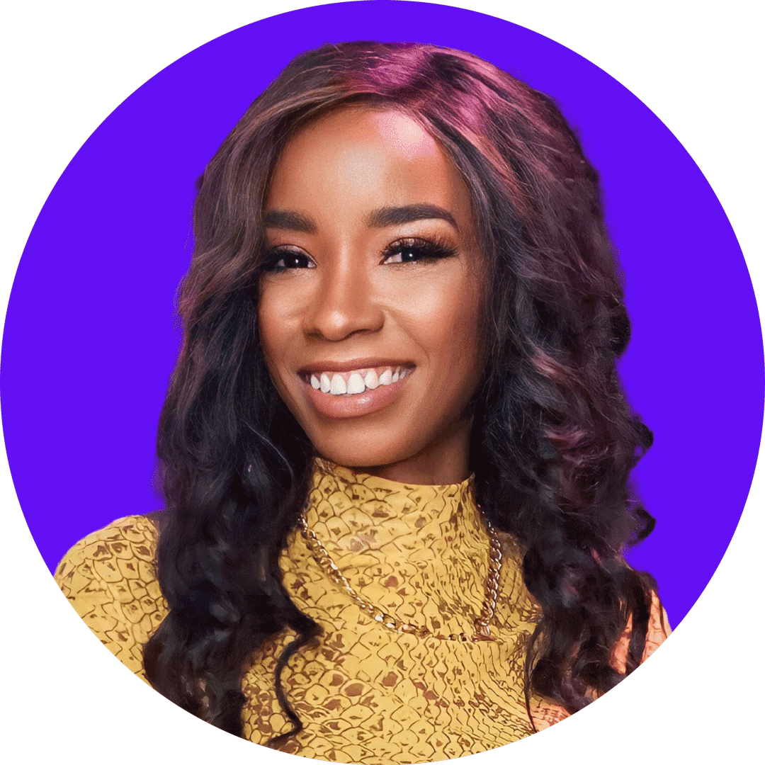 Photo of a Black woman smiling, wearing a yellow top